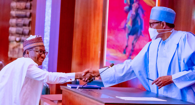 President Buhari swears in new RMAFC Chairman