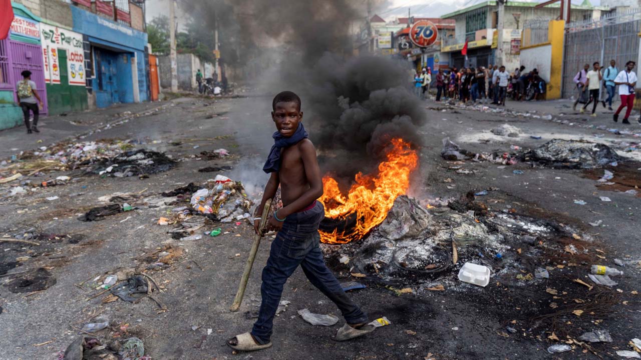 Thousands march in Haiti to protest calls for intervention