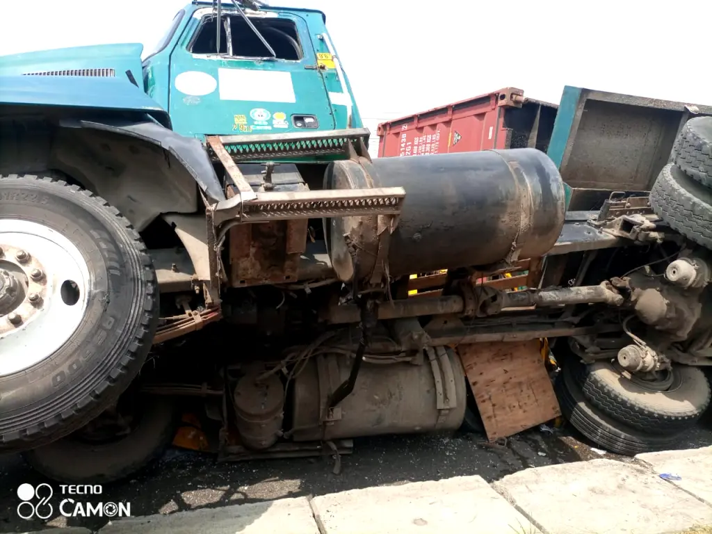 Bus driver dead as 40-feet containers fall on cars in Lagos