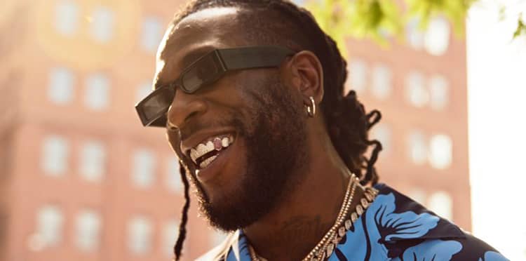 Burna Boy reacts to report of his net worth being $22 Million